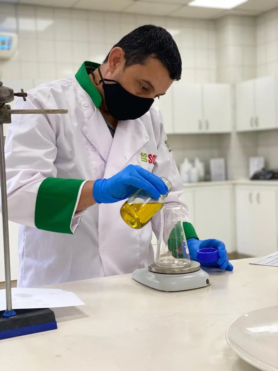 AVO laboratory technician testing an oil sample